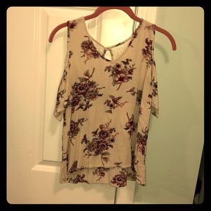 Floral open-shoulder cream and floral shirt